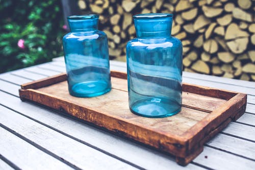 Blue jars on a wooden table