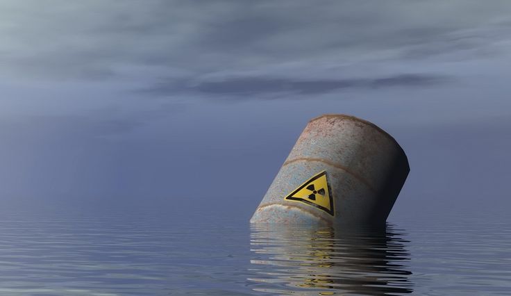 nuclear waste barrel floating in the water