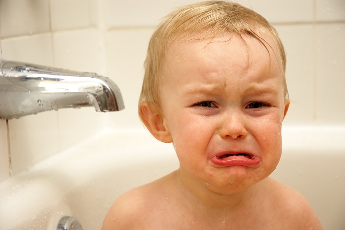 baby boy crying needing emergency pediatric care