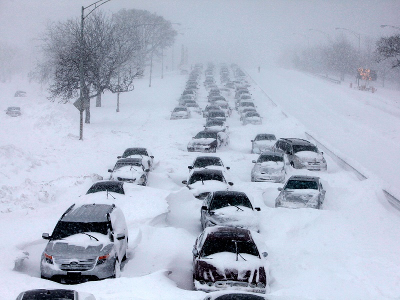 cars stranded on the road because of a snow storm