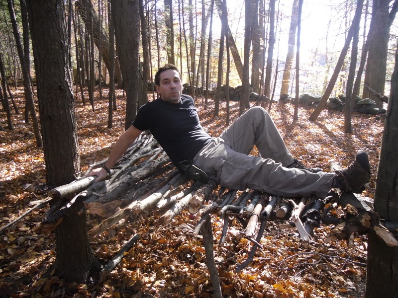 man sitting on a debris bed
