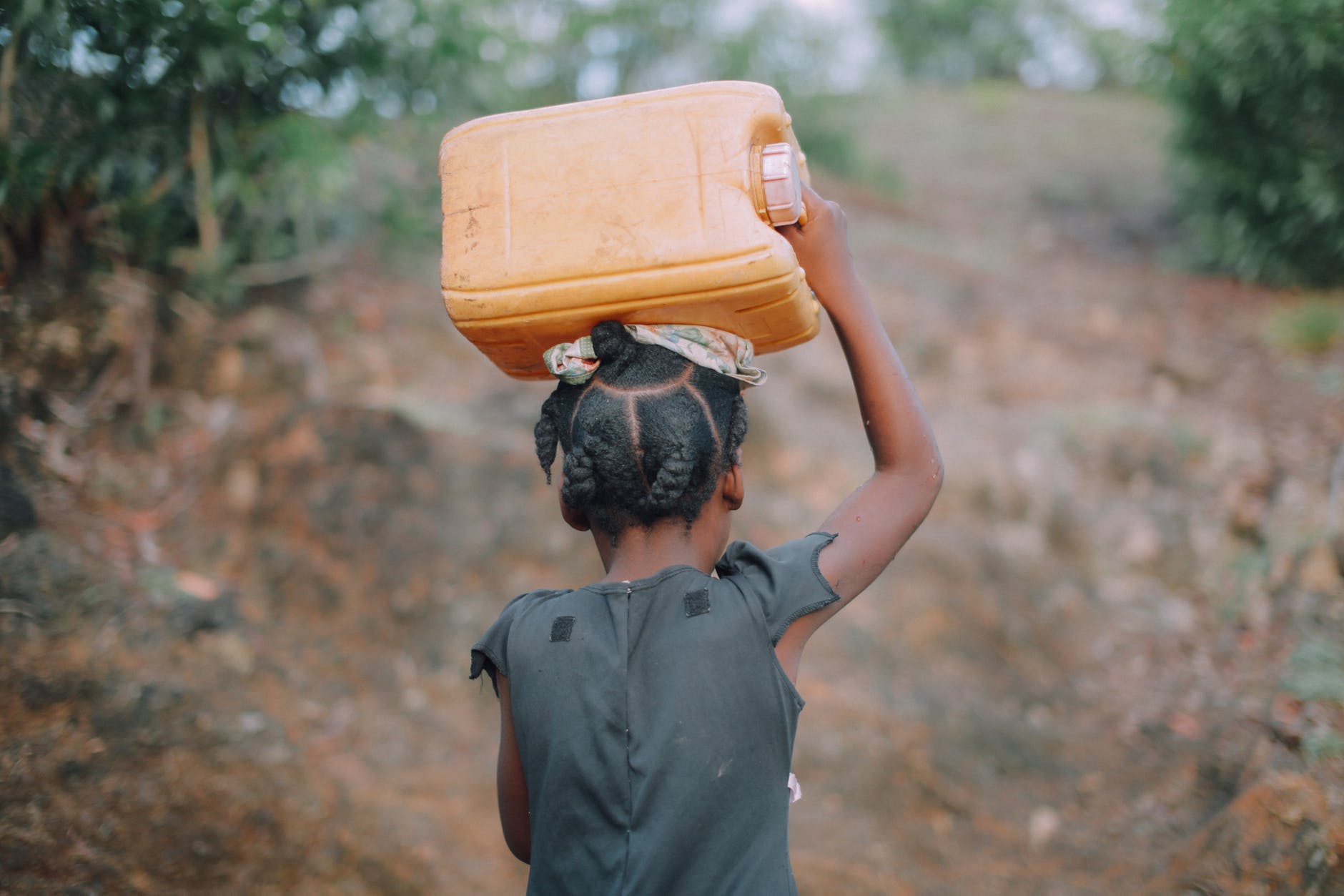 Child carrying jug
