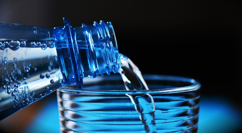 water is essential like this bottled water from a disaster preparedness kit being poured into a cup. 