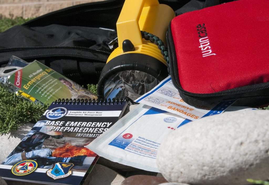 Disaster Preparedness Supplies pictured on ground